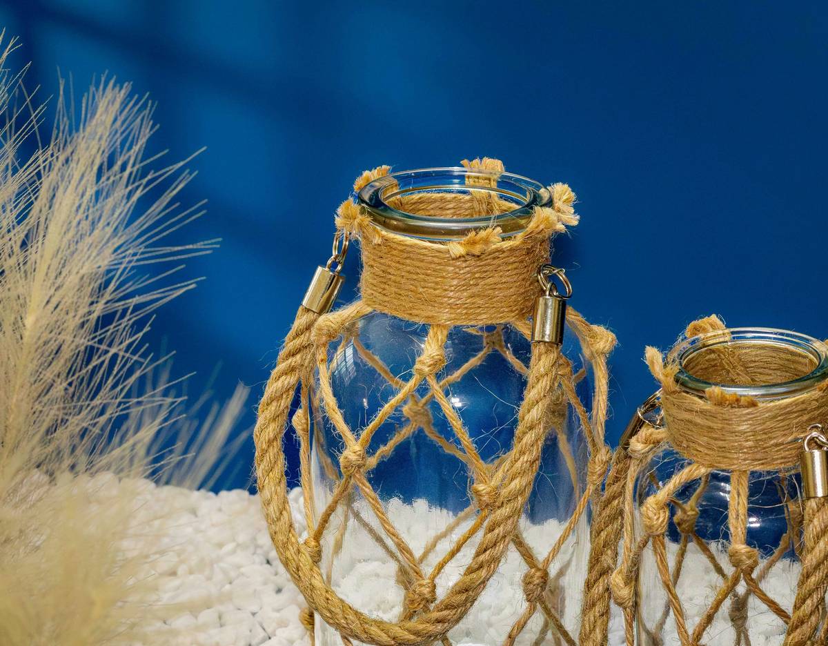 Step-by-step visual guide showing how to make wedding centerpieces using mixed materials and lighting