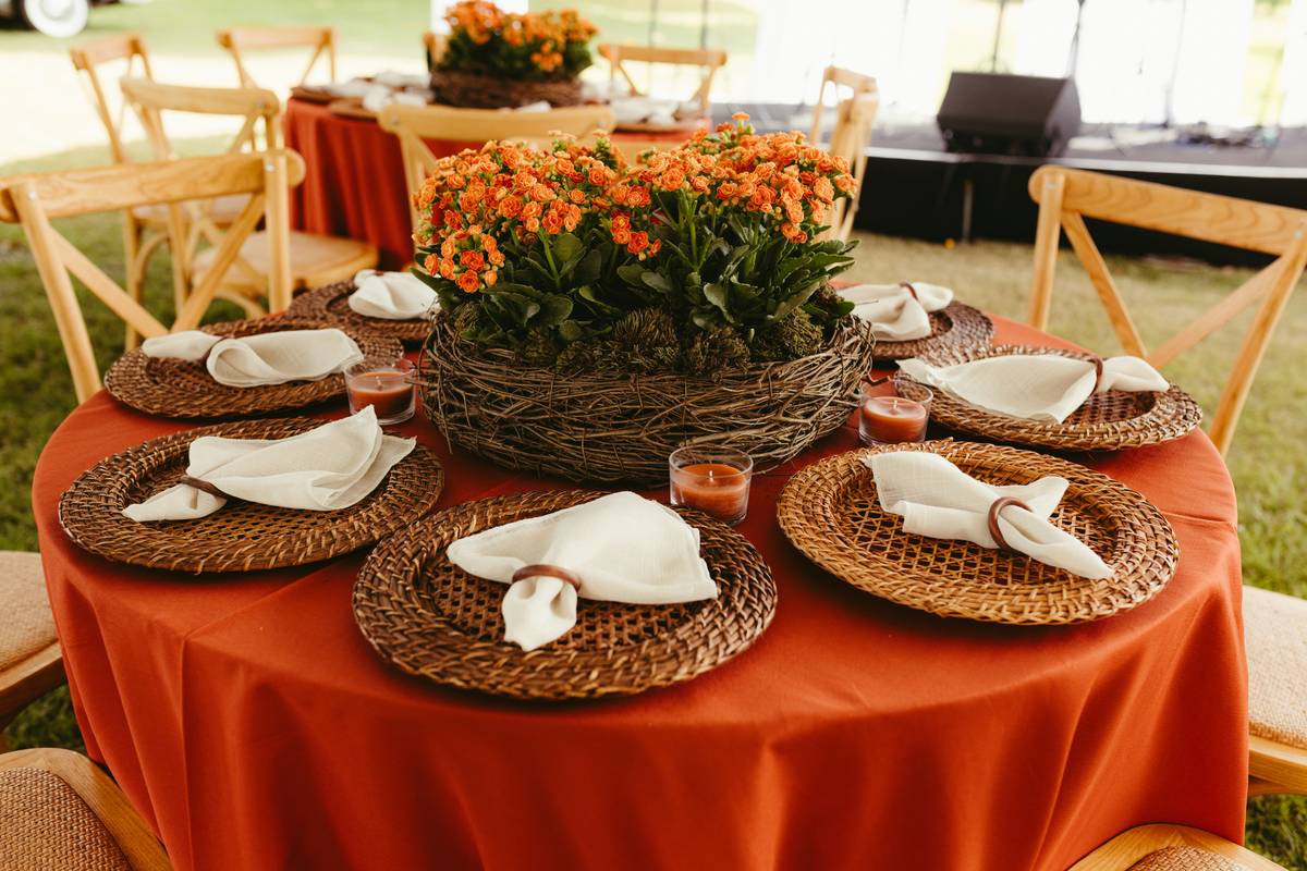 Creative of centerpieces for parties featuring angled brass telescopes and dried lavender